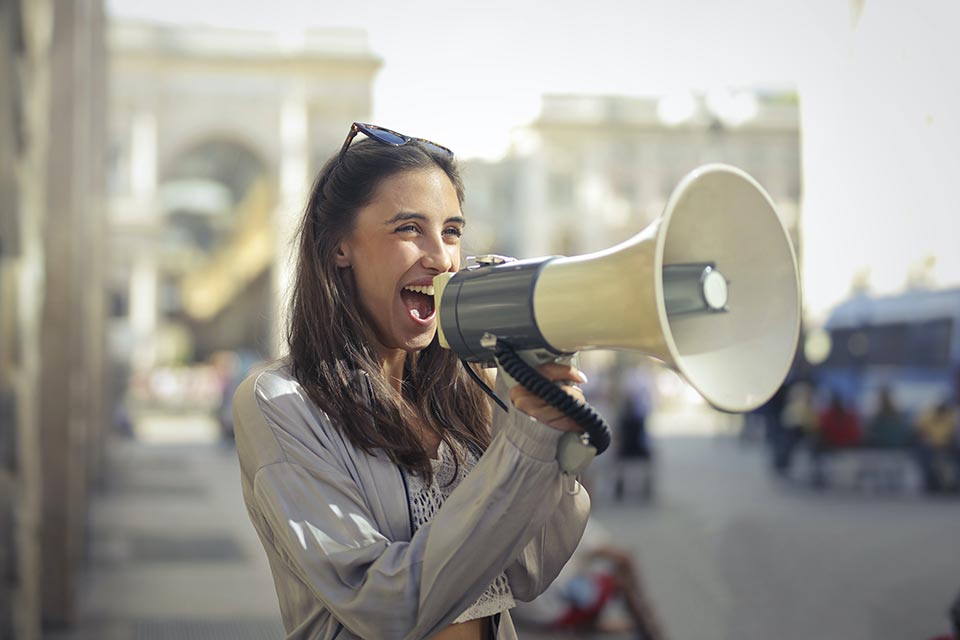 woman speaking in a megaphone